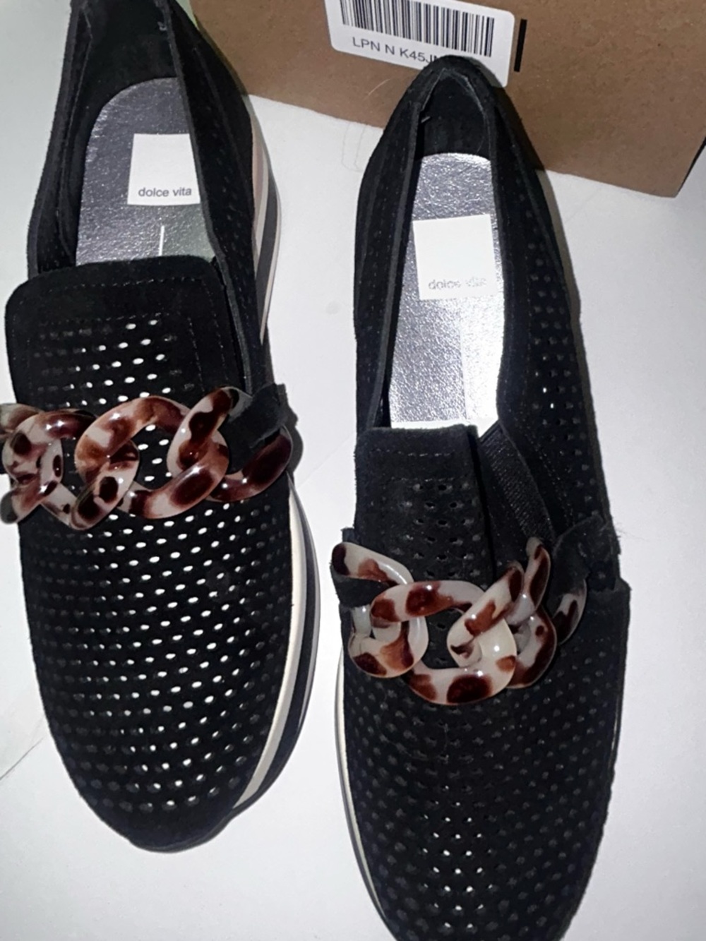 Dolce Vita Black Perforated Slip-On Loafers with Tortoiseshell Chain Accent - Picture 2 of 6